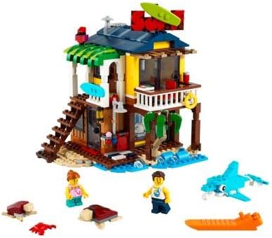 LEGO Creator 3 in 1 Surfer Beach House with 2 Minifigures and Dolphin Figure, Transforms from Surf Shack to Lighthouse to Pool House, Great Building Toy Set for Kids, Girls, and Boys Ages 8+, 31118