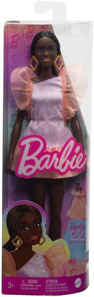 Barbie Fashionistas Doll #216 with Tall Body & Black Hair in Low Ponytail in Pink & Peach Party Dress, 65th Anniversary Collectible Toy