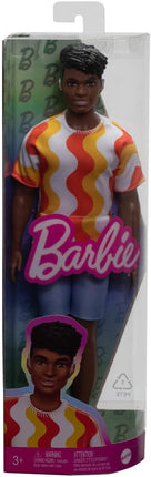 Barbie Fashionistas Ken Doll #220 with Behind-The-Ear Hearing Aids & Broad Body Wearing a Removable Orange Patterned Shirt, Shorts & Jelly Sandals