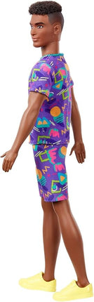 Barbie Ken Fashionistas Doll #162 with Rooted Brunette Hair Wearing Graphic Purple Top, Shorts & Yellow Shoes, Toy for Kids 3 to 8 Years Old