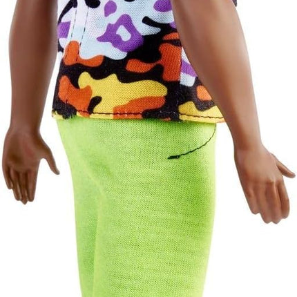 Barbie Fashionistas Ken Doll #123, Broad with Black Curly Hair Wearing Multi-Colored Camo Print Shirt, Neon Green Shorts & Silvery Sneakers