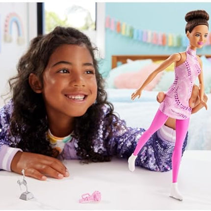 Barbie Careers Fashion Doll & Accessories, Brunette Ice Skater in Removable Pink Outfit with Ice Skates & Trophy