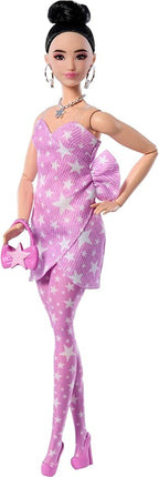 Barbie Deluxe Style Doll #11 in Pink Denim Star-Print Dress with Matching Tights, Black Hair in High Bun, Accessories Like Handbag and Jewelry