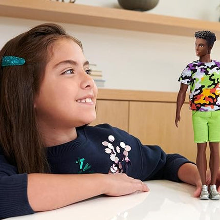 Barbie Fashionistas Ken Doll #123, Broad with Black Curly Hair Wearing Multi-Colored Camo Print Shirt, Neon Green Shorts & Silvery Sneakers