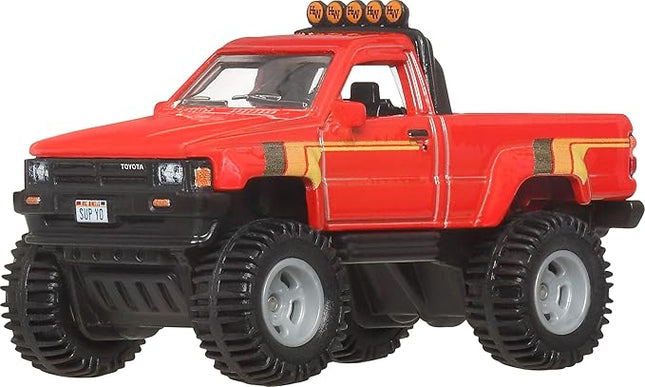 Hot Wheels Premium Car Culture Collectible Toy Car, 1:64 Scale Die-Cast 1987 Toyota Pickup Truck, Off Road Vehicle with Real Riders Tires