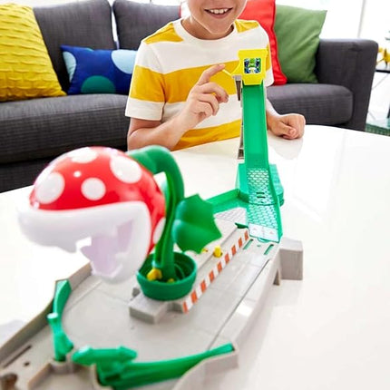 Hot Wheels Mario Kart Track Set & Toy Car, Piranha Plant Slide Playset with First-Appearance Yoshi Kart Vehicle & Gravity Launcher