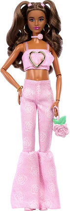 Barbie Deluxe Style Doll #12 in Pink Denim Crop Top with Matching Rose Print Flare Jeans, Wavy Brown Hair, Accessories Like Rose Handbag and Jewelry