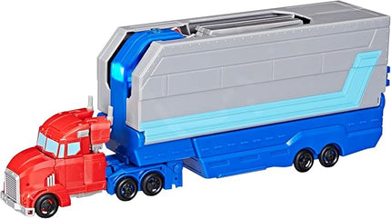 Transformers EarthSpark Optimus Prime Battle Trailer Playset with Action Figure, Lights and Sounds, Electronic Truck Toys for Kids 6 and Up