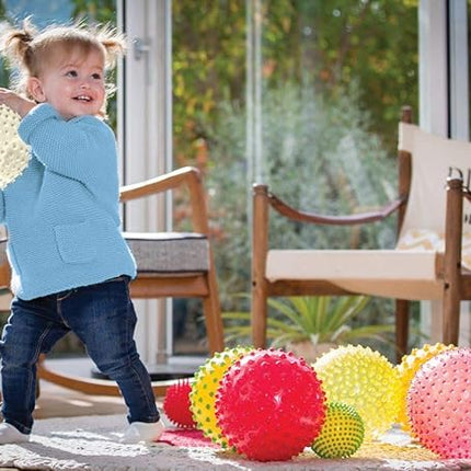 Edushape The Original Sensory Ball for Baby - 7" Glow-in-The-Dark Color Baby Ball That Helps Enhance Gross Motor Skills for Kids Aged 6 Months & Up - Vibrant, Colorful & Unique Toddler Ball