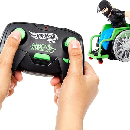 Hot Wheels RC Aaron Wheelz Wheelie Chair, Remote-Control Wheelchair with Motocross Aaron "Wheelz" Fotheringham Figure