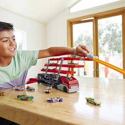 Hot Wheels Toy Truck Track Set, HW Mega Hauler Playset, Stores 50+ Vehicles, Expands to 6 Levels, Connects to Tracks