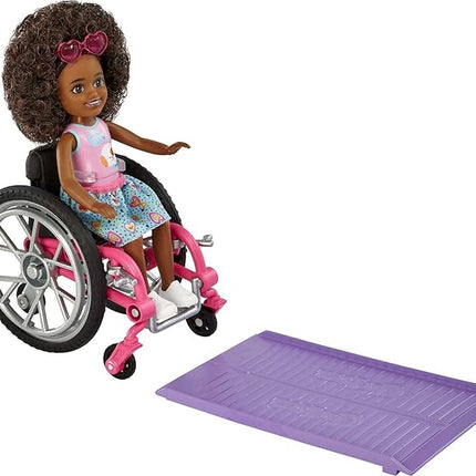 Barbie Chelsea Doll & Wheelchair with Moving Wheels, Ramp, Sticker Sheet & Accessories, Small Doll with Curly Brown Hair