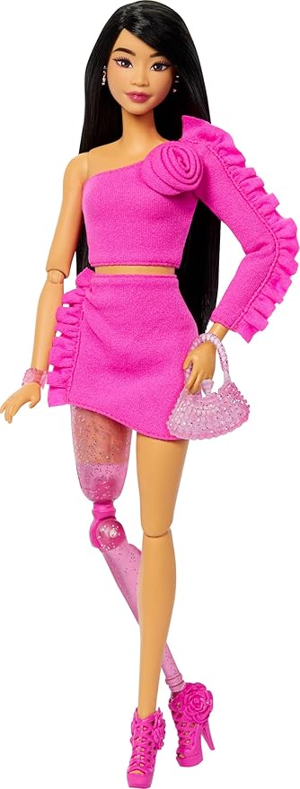 Barbie Deluxe Style Doll #2 in Barbiecore Outfit, Black Hair and Glittery Prosthetic Leg, Pink Top and Skirt Set with Rosette Detail and Accessories