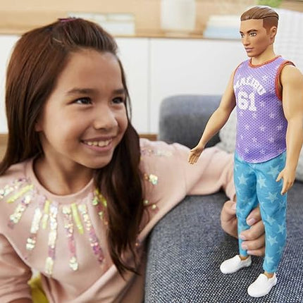 Barbie Ken Fashionistas Doll #165 with Sculpted Brown Hair Wearing Purple “Malibu” Top, Blue Starred Joggers & White Shoes, Toy for Kids 3 to 8 Years Old