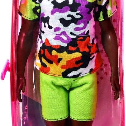 Barbie Fashionistas Ken Doll #123, Broad with Black Curly Hair Wearing Multi-Colored Camo Print Shirt, Neon Green Shorts & Silvery Sneakers