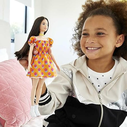Barbie Fashionistas Doll #160 with Long Brunette Hair Wearing Patterned Orange Dress, White Shoes & Yellow Choker, Toy for Kids 3 to 8 Years Old
