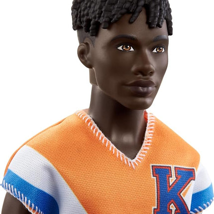 Barbie Fashionistas Ken Fashion Doll with Twisted Black Hair Wearing Orange Athletic Jersey, Shorts & White Sneakers
