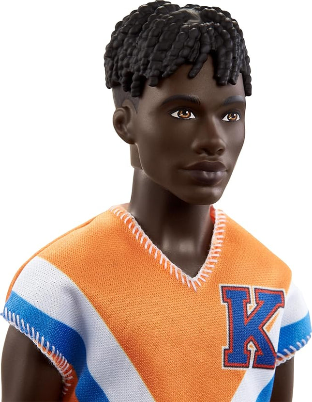Barbie Fashionistas Ken Fashion Doll with Twisted Black Hair Wearing Orange Athletic Jersey, Shorts & White Sneakers