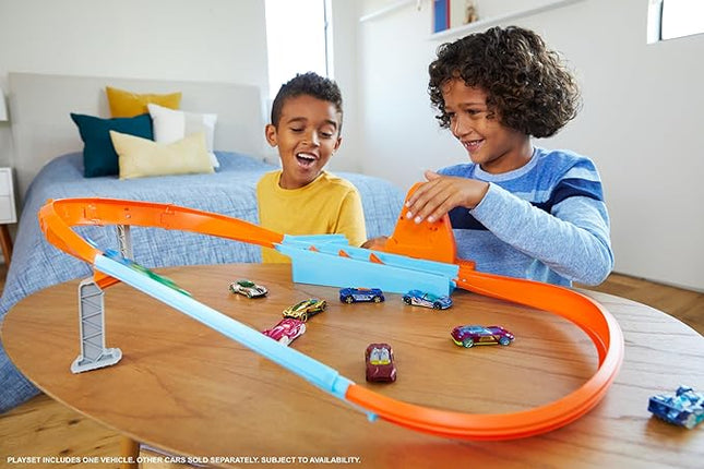 Hot Wheels Toy Car Track Set, Rapid Raceway Champion, Multi-Car Launcher, Connects to Other Sets, Includes 1:64 Scale Car