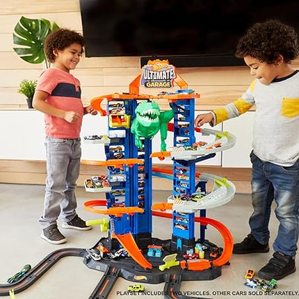 Hot Wheels Ultimate Garage Track Set with 2 Toy Cars, Hot Wheels City Playset with Multi-Level Side-by-Side Racetrack, Moving T-Rex Dino & Storage for 100+ 1:64 Scale Vehicles (Amazon Exclusive)