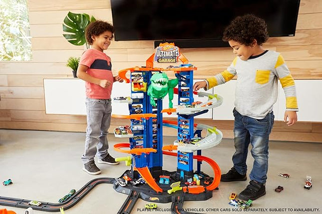 Hot Wheels Ultimate Garage Track Set with 2 Toy Cars, Hot Wheels City Playset with Multi-Level Side-by-Side Racetrack, Moving T-Rex Dino & Storage for 100+ 1:64 Scale Vehicles (Amazon Exclusive)