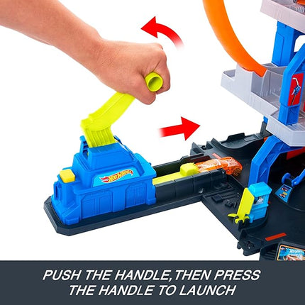 Hot Wheels Toy Car Track Set with Die-Cast Car & Helicopter, 2 Loops, Storage for 36 1:64 Scale Vehicles, Speed Snap Adapters, Mega Loop Garage