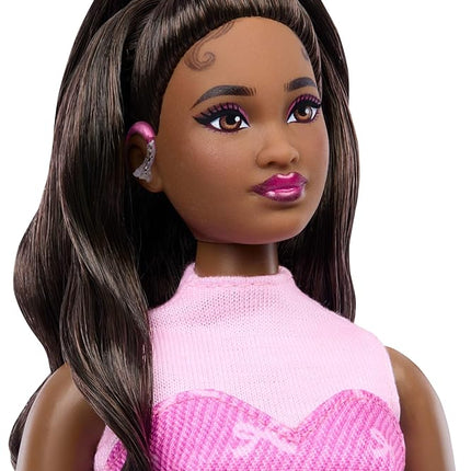 Barbie Deluxe Style Doll #10 in Pink Denim Top and Skirt Set with Bow Print, Black Hair, Behind-The-Ear Hearing Aids and Accessories Like Handbag