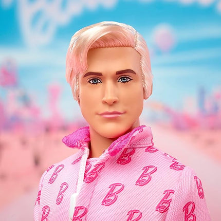 Barbie The Movie Ken Collectible Doll, Ryan Gosling as Ken Wearing Pink Jumpsuit with “B” Detail with White Sneakers and Multicolor Roller Skates