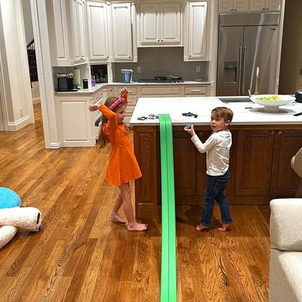 FlexTrack 5000 Flexible Race Car Track for Kids Toy with Suction Cups Compatible with Hot Wheels and Diecast 1/64th Cars and More 15 Feet Long Rolls Up Portable Racetrack (Electric Green)