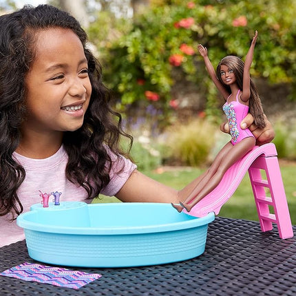Barbie Doll & Pool Playset with Accessories that Include a Pink Slide, Beverages & Towel, Brunette Fashion Doll in Floral Swimsuit